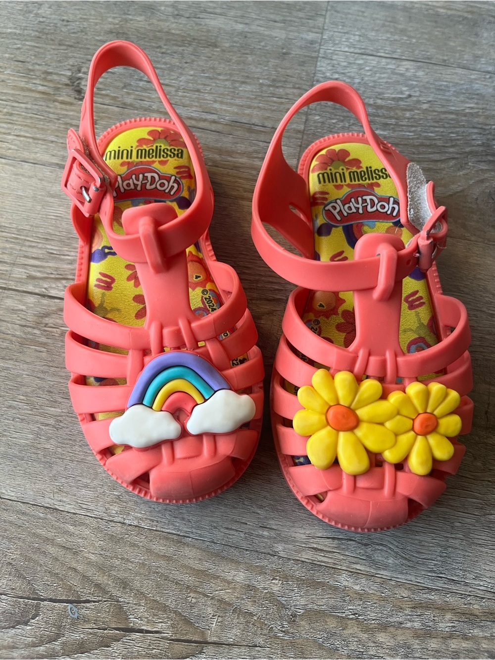 Mini Melissa Coral Jelly Sandals with Rainbow & Yellow Daisy Charms